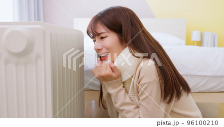 woman feel cold at home woman feel cold at home 96100210