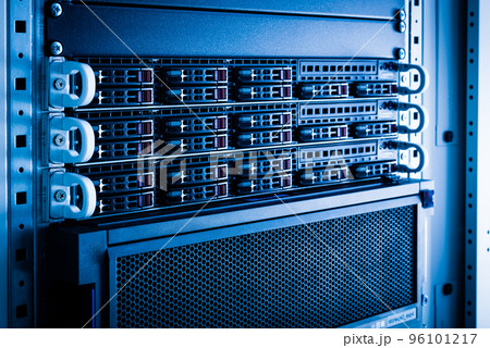 Row of hard drives serving as data storage inside server room Row of hard drives serving as data storage inside server room 96101217