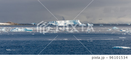Antarctic landscape with iceberg at sea Antarctic landscape with iceberg at sea 96101534