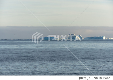Antarctic landscape with iceberg at sea 96101582