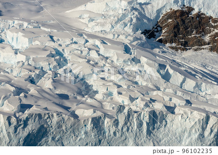 Glacier with crevasse in Antarctic mountains 96102235