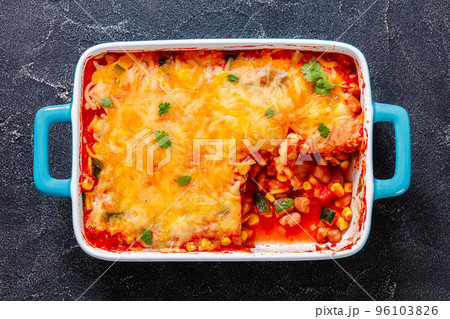 enchilada casserole with veggies, corn, pinto bean enchilada casserole with veggies, corn, pinto bean 96103826