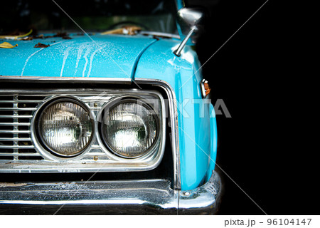 Old blue classic car with headlight.Old blue classic car with headlight, copy space.. 96104147