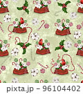 Seamless Christmas pattern with lollipops and red cardinal bird on a light background. 96104402