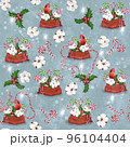 Seamless Christmas pattern with lollipops and red cardinal bird on a blue background 96104404