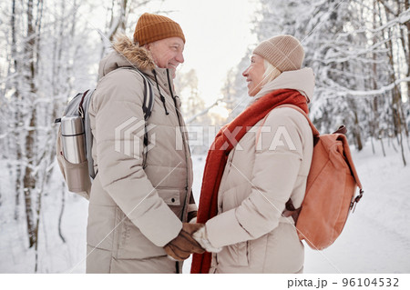 Senior Couple Hiking in Winter Senior Couple Hiking in Winter 96104532