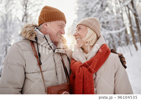Loving Senior Couple Outdoors in Winter Loving Senior Couple Outdoors in Winter 96104535
