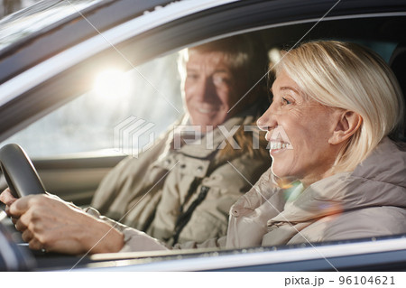 Senior Couple Driving Car 96104621