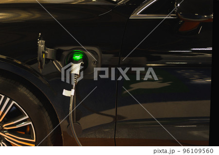 Electric car charging station with vehicle charing batteries. Future of Transportation. 96109560