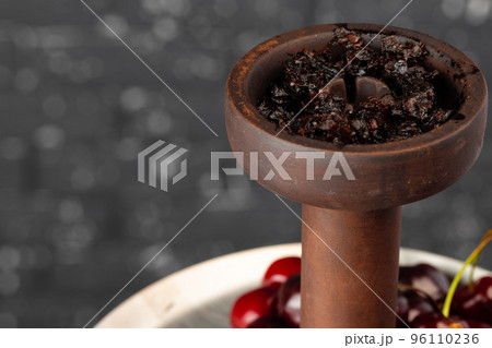 Shisha parts with fresh cherry close up Shisha parts with fresh cherry close up 96110236