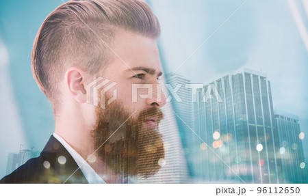 Businessman looks far for the future. Concept of innovation and startup. double exposure Businessman looks far for the future. Concept of innovation and startup. double exposure 96112650