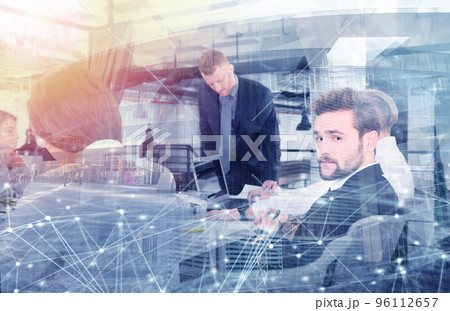 Business people that work together in office with network effects. Concept of teamwork and partnership. double exposure Business people that work together in office with network effects. Concept of teamwork and partnership. double exposure 96112657