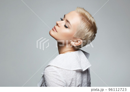Short Hair Beautiful young woman. sensual girl with make-up and blond Hair Short Hair Beautiful young woman. sensual girl with make-up and blond Hair 96112723