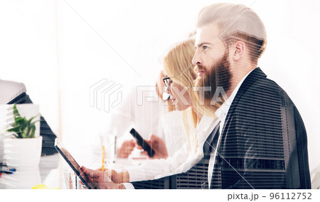 Businessman in office connected to internet network. concept of startup company. double exposure 96112752