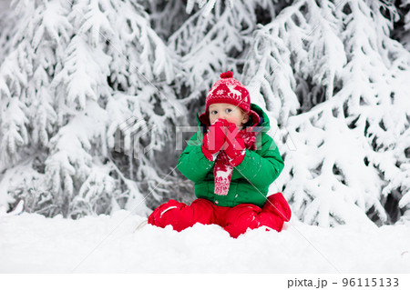 Boy on sleigh ride. Child sledding. Kid with sledge Boy on sleigh ride. Child sledding. Kid with sledge 96115133