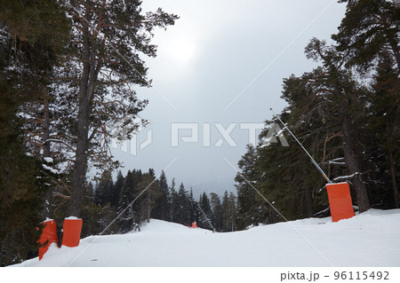 ski slope, snowboard track, forest, snow cannons in ski resort, winter, snow road in snow 96115492