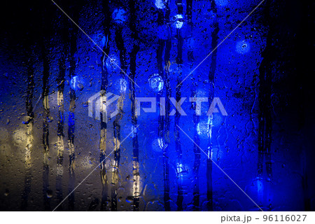 Background of misted glass. Christmas lights 96116027