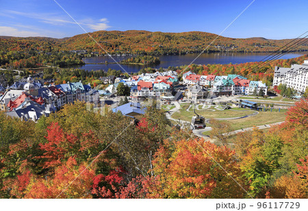 Lake and Mont Tremblant resort in autumn with cable car on the foreground, Canada 96117729