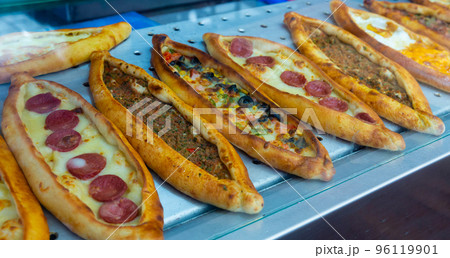 Assorted Turkish foodset. Pide with meat, pide with cheese, pide mix 96119901