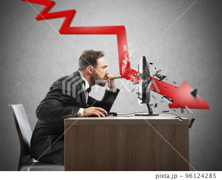 Businessman look the negative report of his company. A red arrow breaks the screen 96124285