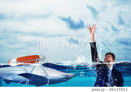 Businessman is likely to drown. Help with deception concept Businessman is likely to drown. Help with deception concept 96125052