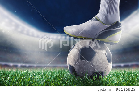 Soccer player with soccerball at the stadium ready for the match 96125925