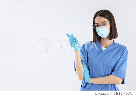 Concept of profession, young female doctor on light background 96127070