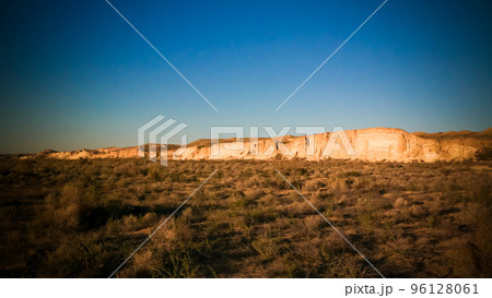 Panorama view to Plateau Ustyurt from the edge of Aral sea near Aktumsuk cape at sunrise, Karakalpakstan, Uzbekistan Panorama view to Plateau Ustyurt from the edge of Aral sea near Aktumsuk cape at sunrise, Karakalpakstan, Uzbekistan 96128061