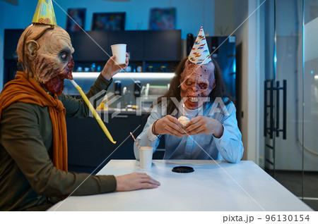 Zombie employees congratulate colleague with birthday 96130154