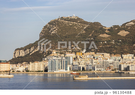 City Buildings, Port and Mountain by the Sea. Sunny Sky. Gibraltar, United Kingdom City Buildings, Port and Mountain by the Sea. Sunny Sky. Gibraltar, United Kingdom 96130488