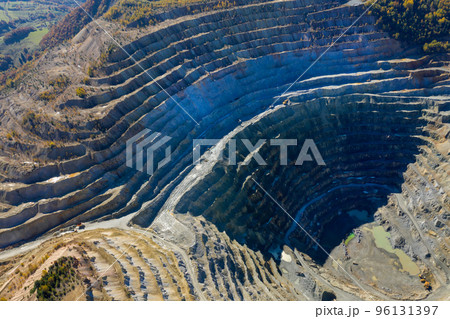 Aerial view of Europe second largest open pit copper mine, Rosia Poieni, Romania Aerial view of Europe second largest open pit copper mine, Rosia Poieni, Romania 96131397