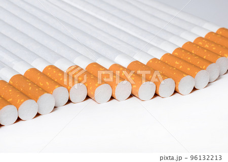Cigarettes in the perspective at the white background Cigarettes in the perspective at the white background 96132213