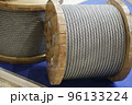 Rope metal steel on a wooden coil. Industrial wire cable 96133224