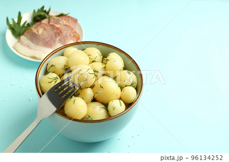 Concept of tasty food with boiled young potatoes, space for text Concept of tasty food with boiled young potatoes, space for text 96134252