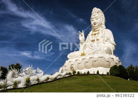 The immense white female Buddha at the Temple of Mercy (Guanyin) in Chiang Mai is easily The immense white female Buddha at the Temple of Mercy (Guanyin) in Chiang Mai is easily 96136522