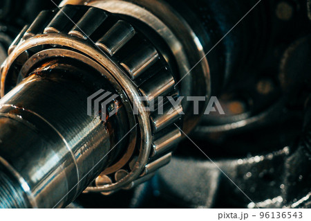 Lubricated roller bearing. Truck suspension repair part. Close-up. Background. 96136543