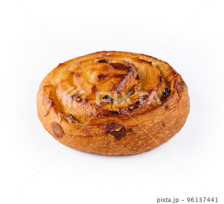 Sweet baked snail with raisins and almond Sweet baked snail with raisins and almond 96137441