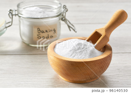 baking soda on a white wooden table, selective focus. 96140530
