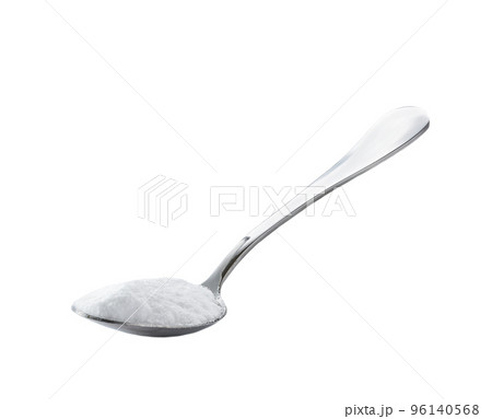 baking soda in a metal spoon isolated on white background. 96140568