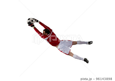 Goalkeeper catches the ball in the stadium. Isolated on white background 96143898