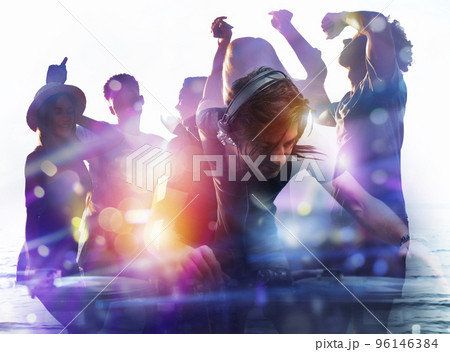 DJ playing music at the discotheque. Double exposure DJ playing music at the discotheque. Double exposure 96146384