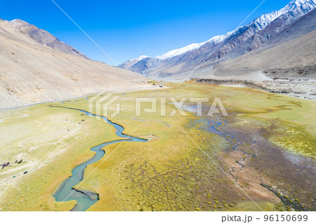 Landscape aerial view of mountains with river and green valley in Himalayas with blue sky in Nubra valley, Jammu and Kashmir, India.  96150699
