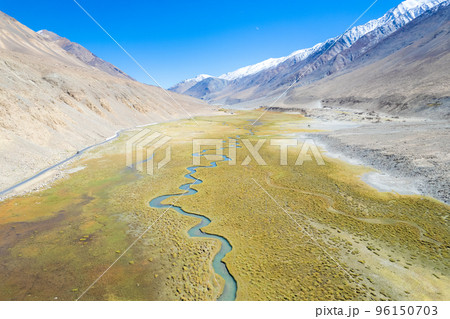 Landscape aerial view of mountains with river and green valley in Himalayas with blue sky in Nubra valley, Jammu and Kashmir, India.  96150703