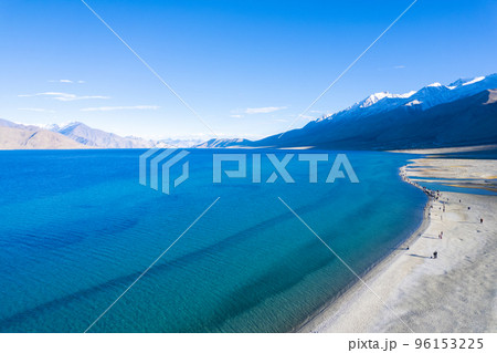 Aerial landscape of Pangong Lake and mountains with clear blue sky, it's a highest saline water lake in Himalayas range, landmarks and popular for tourist attractions in Leh, Ladakh, India, Asia Aerial landscape of Pangong Lake and mountains with clear blue sky, it's a highest saline water lake in Himalayas range, landmarks and popular for tourist attractions in Leh, Ladakh, India, Asia 96153225