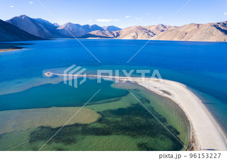 Aerial landscape of Pangong Lake and mountains with clear blue sky, it's a highest saline water lake in Himalayas range, landmarks and popular for tourist attractions in Leh, Ladakh, India, Asia Aerial landscape of Pangong Lake and mountains with clear blue sky, it's a highest saline water lake in Himalayas range, landmarks and popular for tourist attractions in Leh, Ladakh, India, Asia 96153227