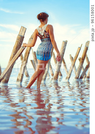 a girl in a swimsuit on a salt lake a girl in a swimsuit on a salt lake 96158001