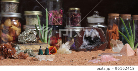 Chakra Stones With Aloe Vera and Incense Cones on Australian Red Sand 96162418