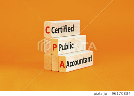CPA certified public accountant symbol. Concept words CPA certified public accountant on wooden blocks on a beautiful orange background Business and CPA certified public accountant concept. Copy space CPA certified public accountant symbol. Concept words CPA certified public accountant on wooden blocks on a beautiful orange background Business and CPA certified public accountant concept. Copy space 96170884