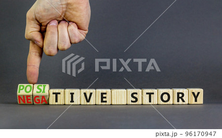 Positive or negative story symbol. Businessman turns cubes, changes concept words Negative story to Positive story. Beautiful grey background. Business positive negative story concept. Copy space. Positive or negative story symbol. Businessman turns cubes, changes concept words Negative story to Positive story. Beautiful grey background. Business positive negative story concept. Copy space. 96170947
