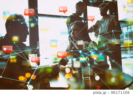 Concept with business people silhouette talking in the office near a window glass. Network effects 96171106